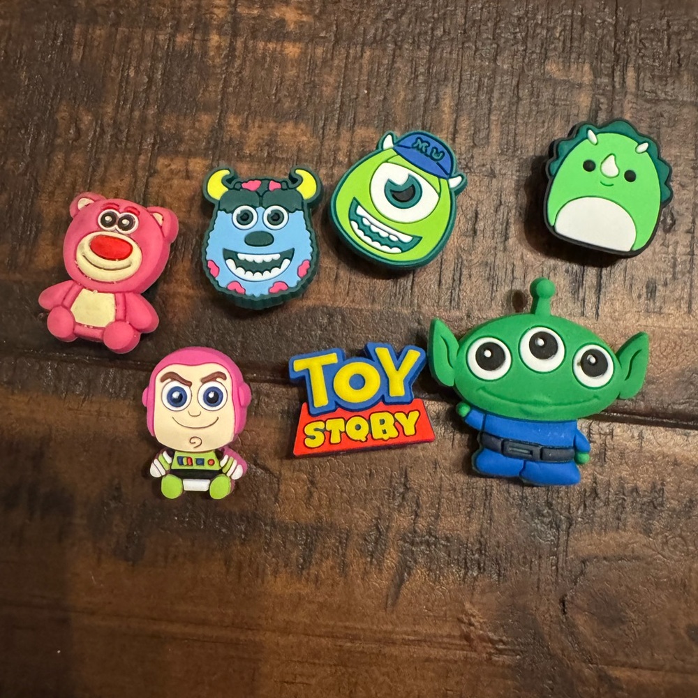 Random Pack of 7 Crocs Jibbitz. Assorted Toy Story Jibbitz